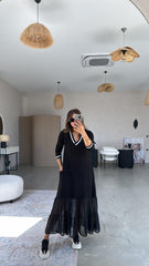 Vestido de malla con patchwork, mangas largas y cuello en V